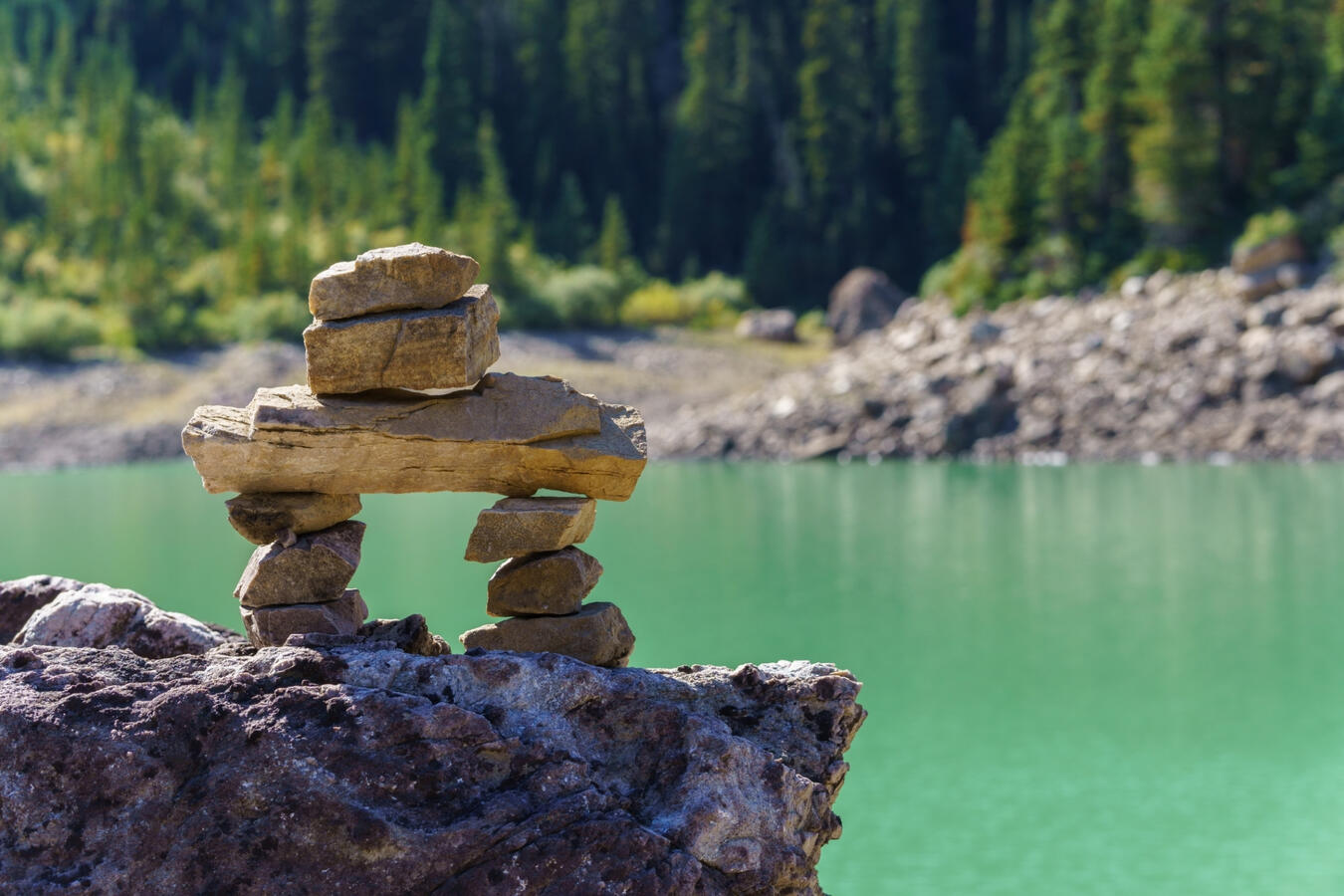 Inukshuk on the shore of Landslide Lake, AB