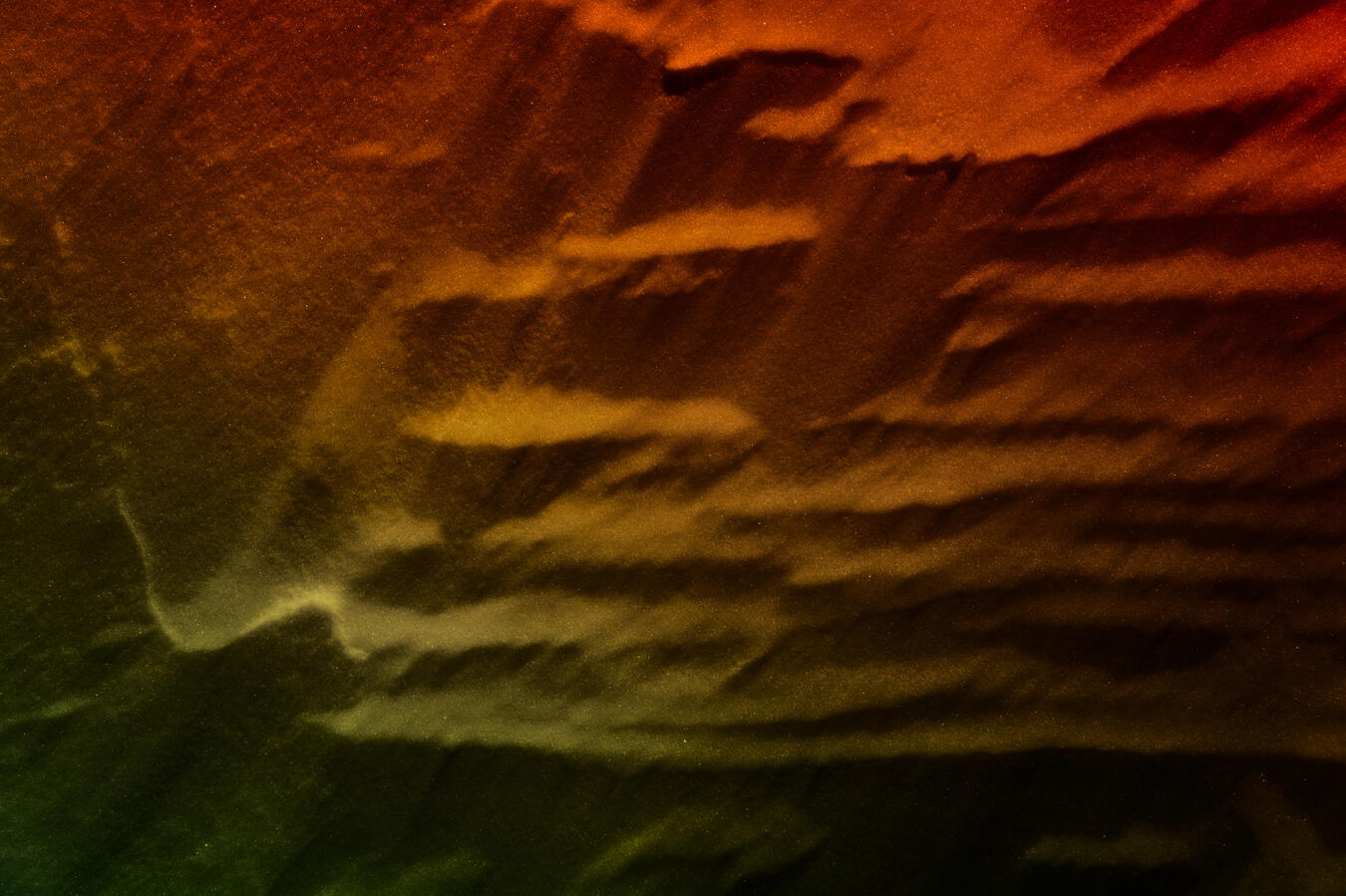 Exhibit 8. The orphan source shines a false light on all in it's path. Drifts of snow shift to glass and then sand. Beams of light stop in parallel lines and then shift around around before stopping on the other side of the sand.